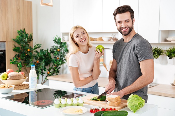 smiling-couple-spending-time-together-kitchen.jpg