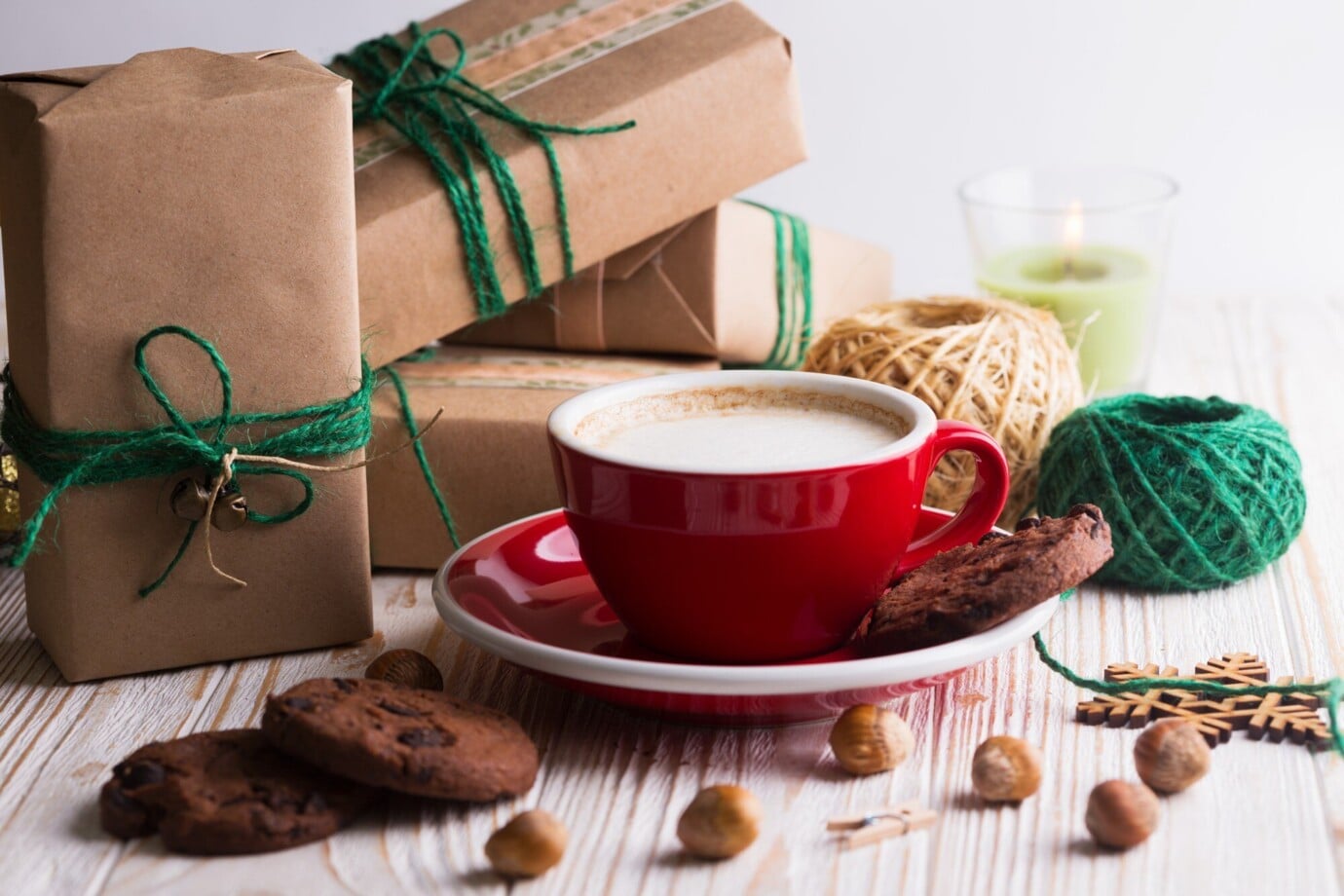 festive-mood-gifts-cup-cappuccino-christmas-decor-wooden-background_522472-2490